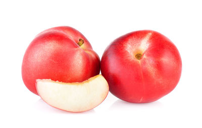 Close-up of apple against white background