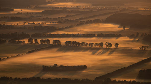 High angle view of landscape against sky during sunset