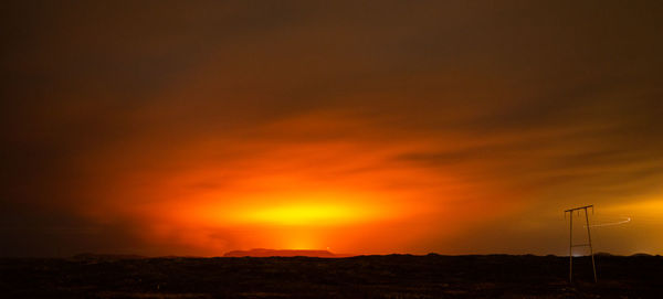 Scenic view of dramatic sky during sunset