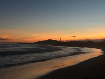 Scenic view of beach during sunset