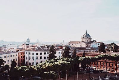 Buildings in city against sky