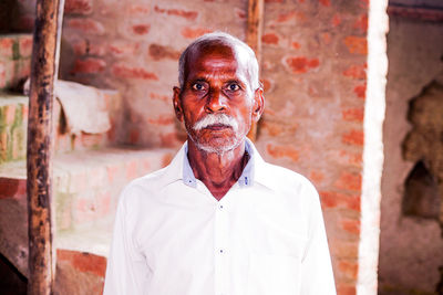 Portrait of man standing outdoors