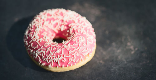 High angle view of pink cake