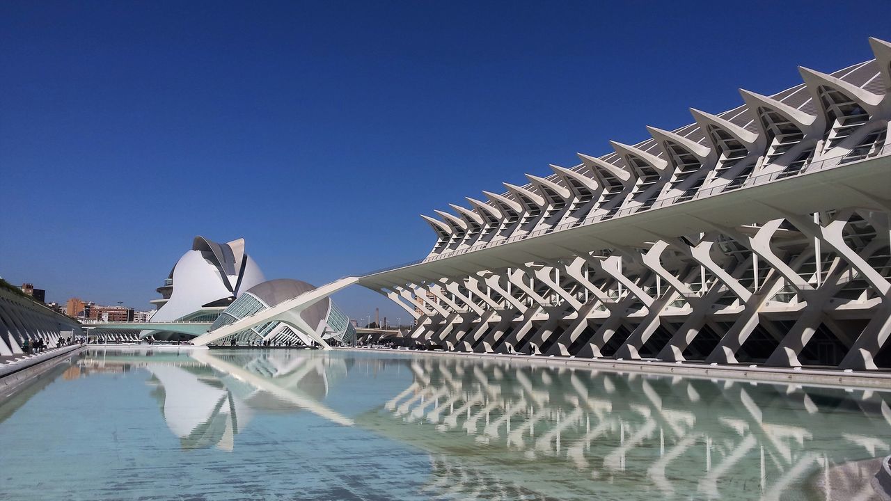 CLOSE-UP OF BRIDGE AGAINST BLUE SKY