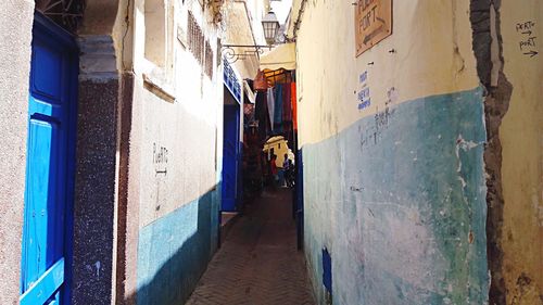 Rear view of people walking on street