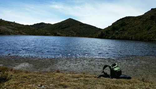 Scenic view of cerro chirripo by lake against sky