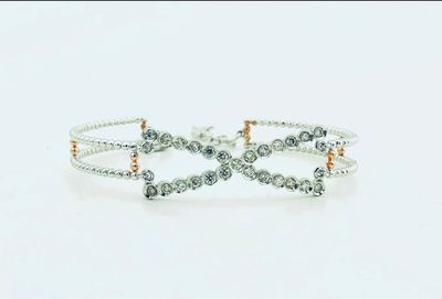 Close-up of wedding rings on white background