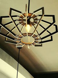 Low angle view of illuminated lamp