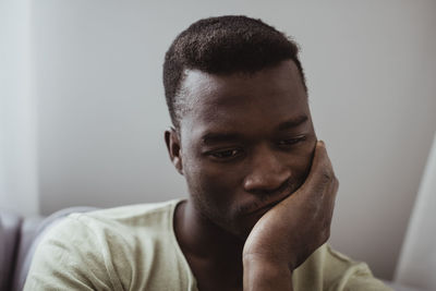 Close-up of worried man at home