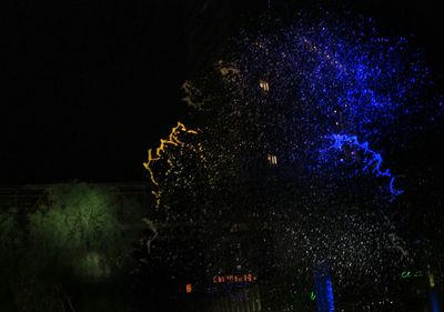 Firework display at night