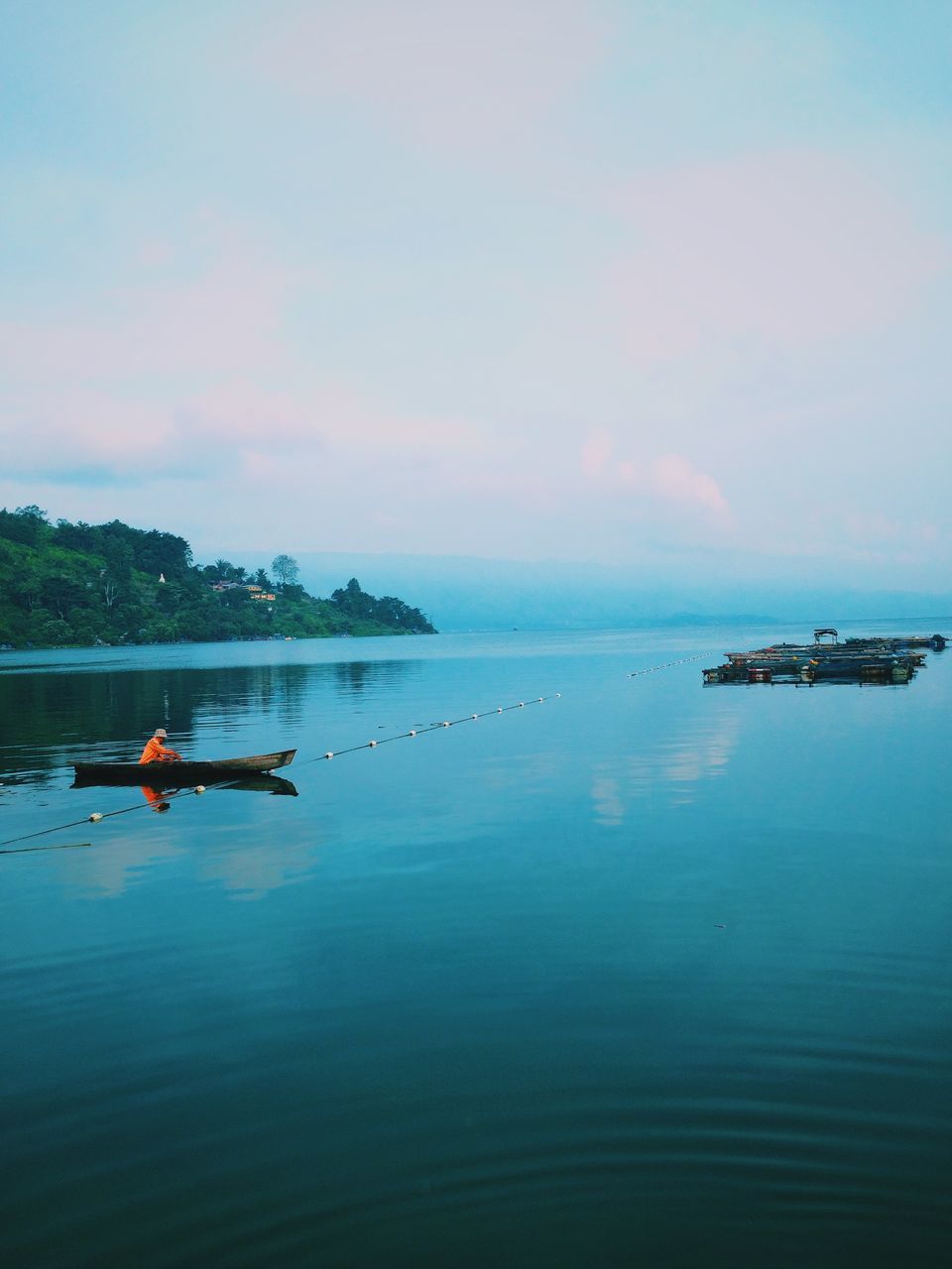 nautical vessel, transportation, mode of transport, water, boat, sea, sky, waterfront, tranquil scene, tranquility, scenics, beauty in nature, nature, sailing, travel, moored, horizon over water, cloud - sky, idyllic, outdoors