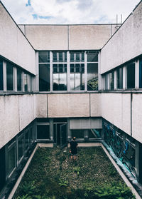 Rear view of man outside building