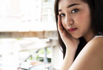 Close-up portrait of beautiful young woman