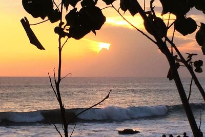 Scenic view of sea against sky at sunset