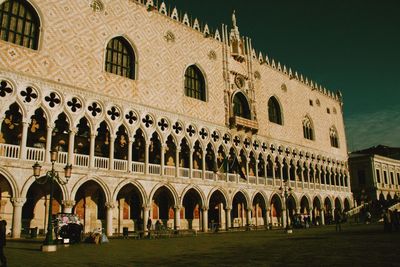 Exterior of historic building against sky at night