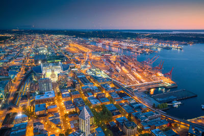 Aerial view of city at sunset