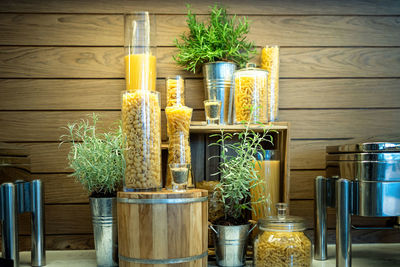 Potted plants in jar