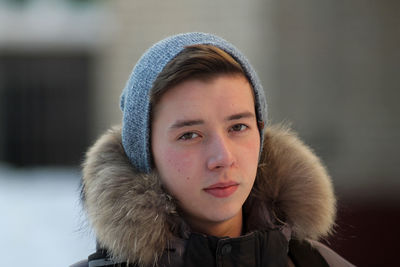 Close-up portrait of man wearing knit hat