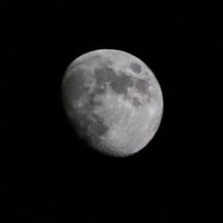 Scenic view of moon against sky at night