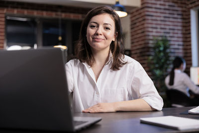 Portrait of businesswoman sitting in office