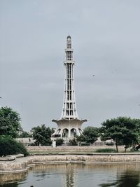 Low angle view of minar-e-pakistan against clear sky