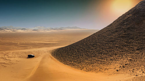 Scenic view of desert against sky