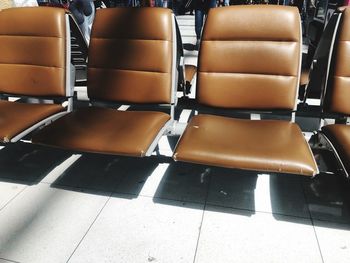 High angle view of empty chairs on table