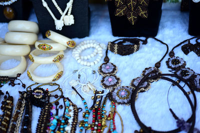 Close-up of decorations for sale at market stall