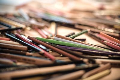 Full frame shot of pencils on table