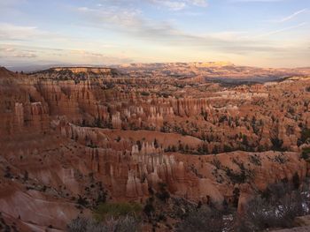 Aerial view of rock formations against sky