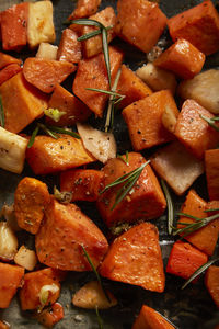 Baked sweet potatoes with thyme and seasoning