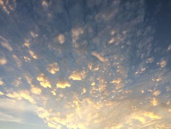 Low angle view of dramatic sky during sunset