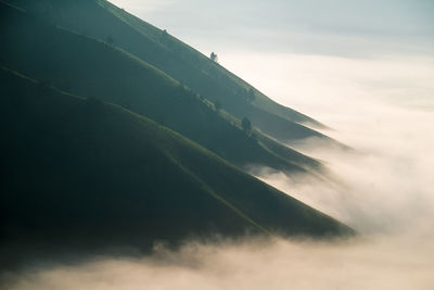 Low angle view of land against sky