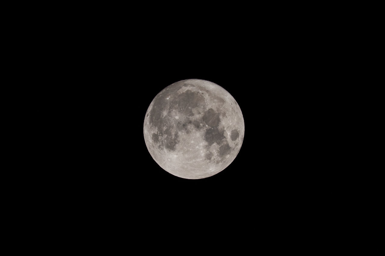 LOW ANGLE VIEW OF FULL MOON AGAINST SKY