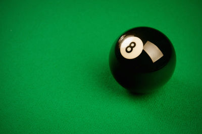 Close-up of green object on table