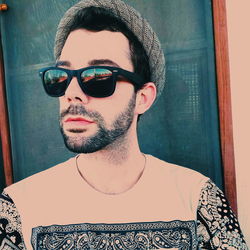 Portrait of young man wearing sunglasses