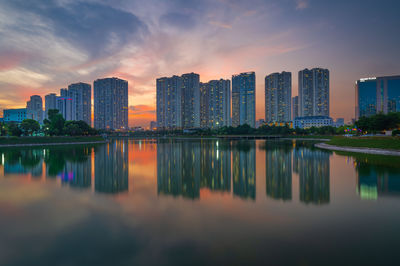 Reflection of illuminated buildings in water