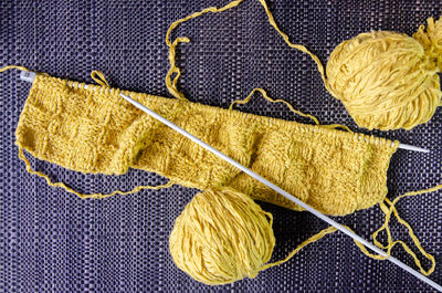 Close-up of yellow butterfly on fabric