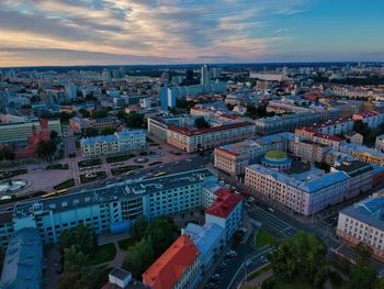 High angle view of buildings against sky during sunset