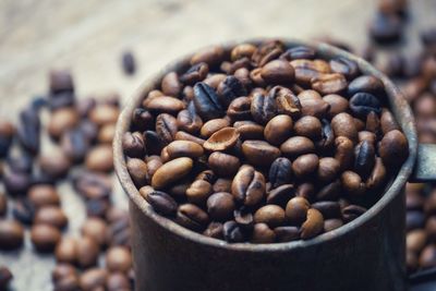 Close-up of coffee beans on table