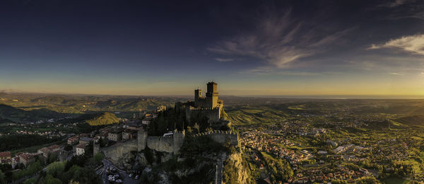 High angle view of townscape against sky during sunset