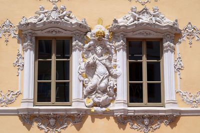 Virgin mary, house of falcon, the finest rococo style building in the wurzburg, germany