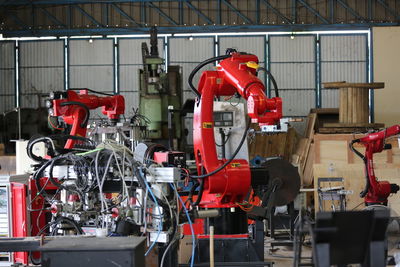 Automatics robot arm and operating control machine in factory.