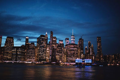 Illuminated buildings in city at night