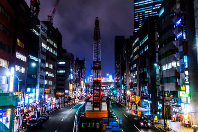 Traffic on city street at night