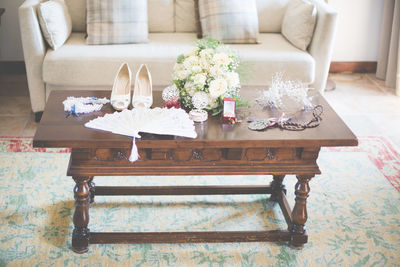 Flower vase on table at home