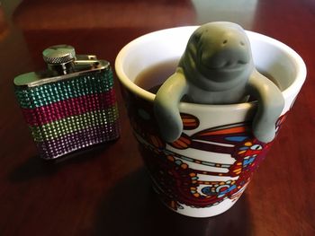 Close-up of cup on table