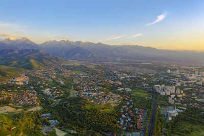 High angle view of buildings in city against sky