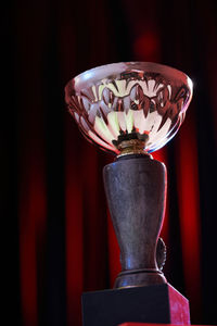 Close-up of electric lamp on table