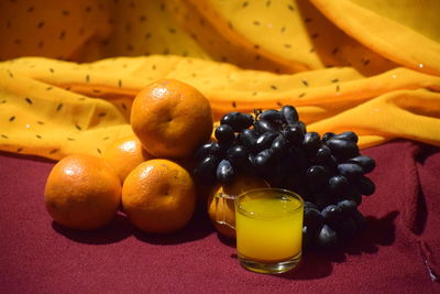 High angle view of grapes in glass on table